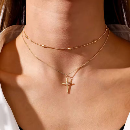 Colar Duplo com Pingente de Cruz – Dourado e Prateado